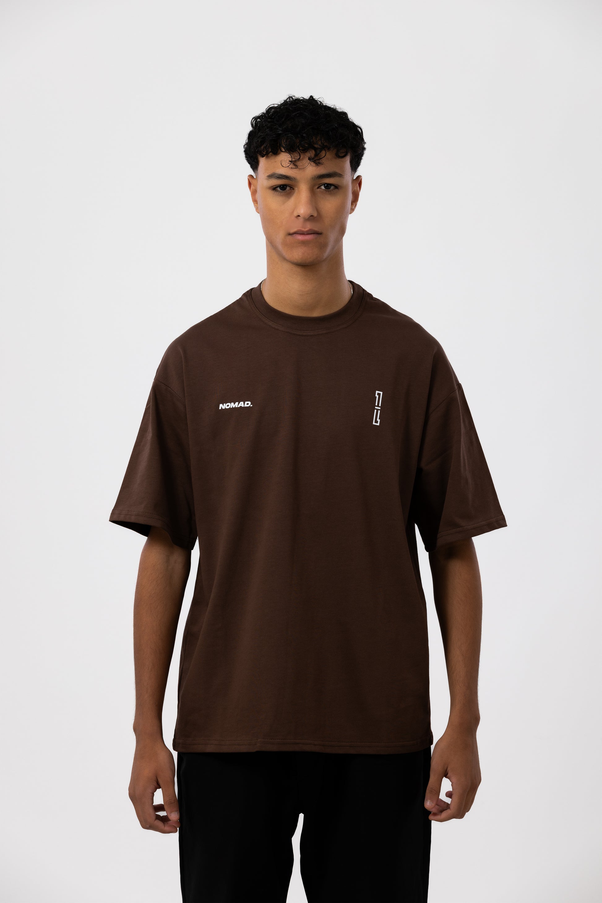 One of one NOMAD brown tshirt